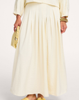 CANSU Pleated long skirt Coconut milk