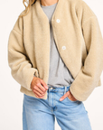 Celio zand kleur fake fur jasje